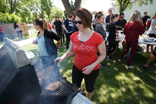 MIKE DEAL / WINNIPEG FREE PRESS
Rachelle Neault a Metis Community Liaison Worker with the MMF prepares smokies and burgers for about sixty people at a Bar-B-Q to celebrate the 202nd Anniversary of the Victory of Frog Plain, also known as the Battle of Seven Oaks. It was fought as part of the 1816 Pemmican War, where Métis of the North West Company fought and won against Hudson's Bay Company employees and settlers. The battle is considered to be an important historical moment in the creation of the Métis Nation.
180619 - Tuesday, June 19, 2018.