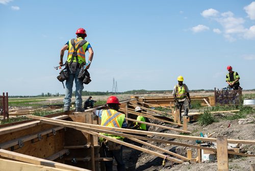 ANDREW RYAN / WINNIPEG FREE PRESS Construction workers work on the main rink of the RTC building which will be 95,000 square feet when completed.