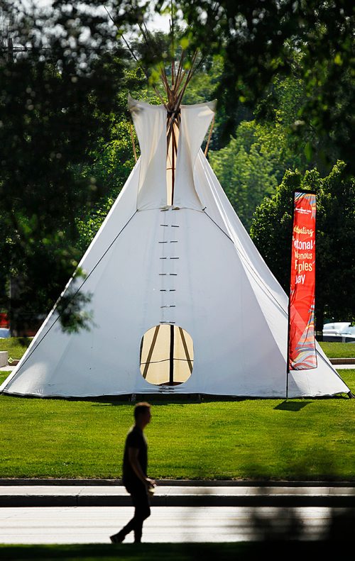 PHIL HOSSACK / WINNIPEG FREE PRESS -  A teepee stands proud on the grounds of Great West Life at Broadway and Osborne, see story. - June 20, 2018
