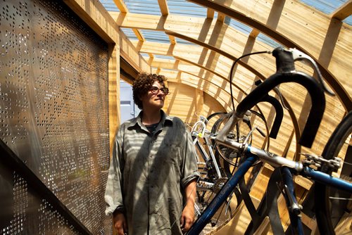 ANDREW RYAN / WINNIPEG FREE PRESS Anna Weier poses for a portrait in the newly built UMCycle parking shed on the University of Manitoba campus June 20, 2018.