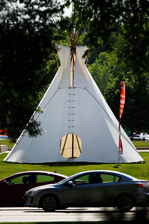 PHIL HOSSACK / WINNIPEG FREE PRESS -  A teepee stands proud on the grounds of Gret West Life at Broadway and Osborne, see story. - June 20, 2018