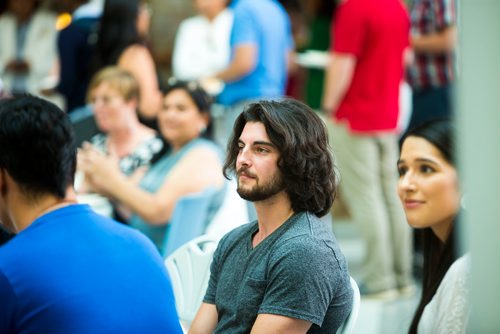 MIKAELA MACKENZIE / WINNIPEG FREE PRESS
Nicolas Hince, U of M engineering student, watches the Indigenous Peoples Day festivities at the University of Manitoba Bannatyne campus in Winnipeg on Thursday, June 21, 2018. 
Mikaela MacKenzie / Winnipeg Free Press 2018.