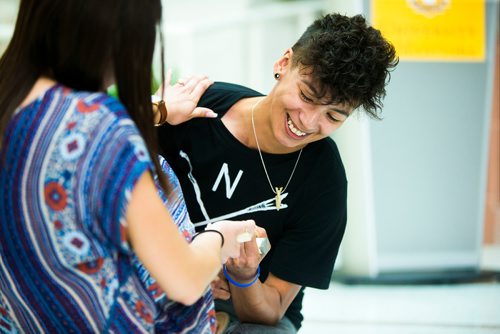 MIKAELA MACKENZIE / WINNIPEG FREE PRESS
Inuk Maxine Angoo demonstrates Inuit games at Indigenous Peoples Day festivities at the University of Manitoba Bannatyne campus in Winnipeg on Thursday, June 21, 2018. 
Mikaela MacKenzie / Winnipeg Free Press 2018.