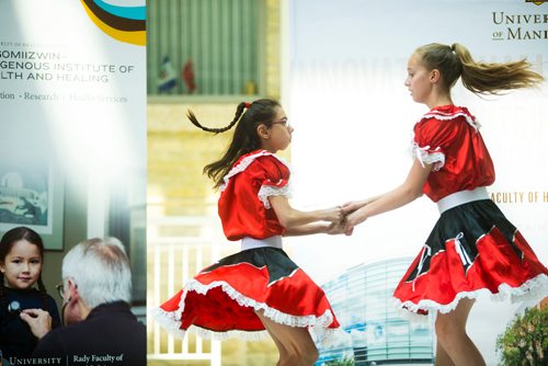 MIKAELA MACKENZIE / WINNIPEG FREE PRESS
Clarissa Spence (left) and Danya Mozdzen jig at Indigenous Peoples Day festivities at the University of Manitoba Bannatyne campus in Winnipeg on Thursday, June 21, 2018. 
Mikaela MacKenzie / Winnipeg Free Press 2018.