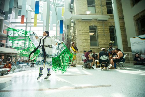 MIKAELA MACKENZIE / WINNIPEG FREE PRESS
Robin Parisian does a fancy shawl dance at Indigenous Peoples Day festivities at the University of Manitoba Bannatyne campus in Winnipeg on Thursday, June 21, 2018. 
Mikaela MacKenzie / Winnipeg Free Press 2018.