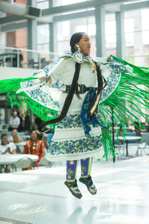 MIKAELA MACKENZIE / WINNIPEG FREE PRESS
Robin Parisian does a fancy shawl dance at Indigenous Peoples Day festivities at the University of Manitoba Bannatyne campus in Winnipeg on Thursday, June 21, 2018. 
Mikaela MacKenzie / Winnipeg Free Press 2018.