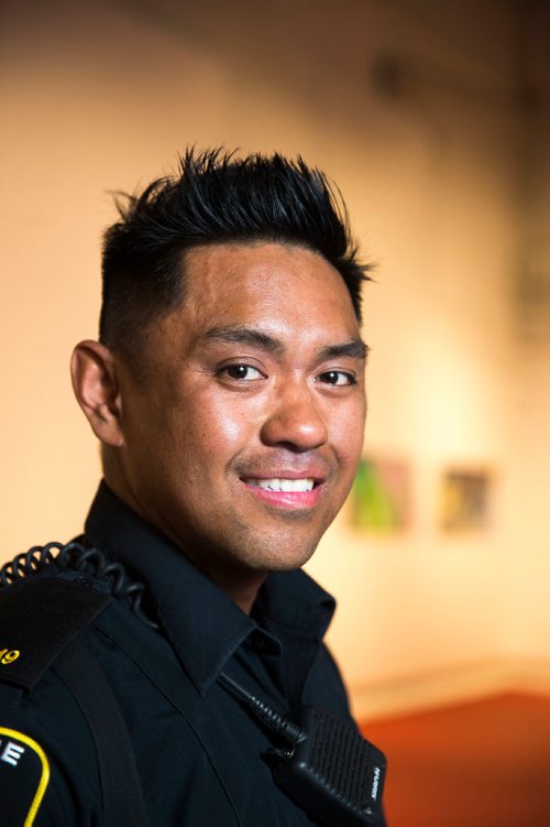 MIKAELA MACKENZIE / WINNIPEG FREE PRESS
Constable Orlando Buduhan poses with his work at the Graffiti Gallery in Winnipeg on Thursday, June 21, 2018. Graffiti Gallery's new exhibit, Intersections, is opening soon showcasing the work created in partnership with Graffiti Art Programming and the Winnipeg Police Service.
Mikaela MacKenzie / Winnipeg Free Press 2018.