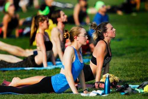 PHIL HOSSACK / WINNIPEG FREE PRESS -  About 300 yogis descended on the Lyric Stage at Assinaboine Park Thursday evening in recognition of International Yoga Day. +30C temperatures turned the event into an outdoor Hot Yoga flow class. See release. - June 21, 2018