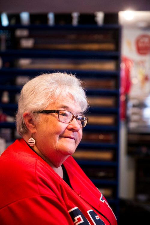 MIKAELA MACKENZIE / WINNIPEG FREE PRESS
Brenda Arnott in her basement, which is devoted to Goldeyes paraphernalia, in Winnipeg on Friday, June 22, 2018. 
Mikaela MacKenzie / Winnipeg Free Press 2018.