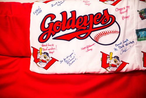 MIKAELA MACKENZIE / WINNIPEG FREE PRESS
Brenda Arnott in her basement, which is devoted to Goldeyes paraphernalia, in Winnipeg on Friday, June 22, 2018. 
Mikaela MacKenzie / Winnipeg Free Press 2018.