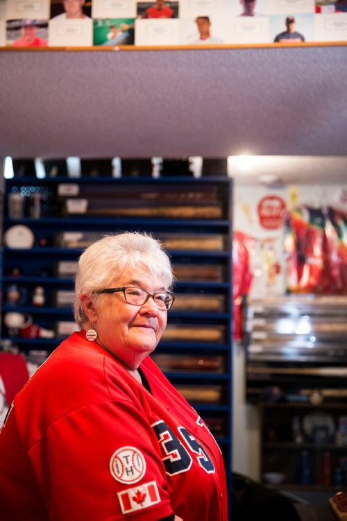 MIKAELA MACKENZIE / WINNIPEG FREE PRESS
Brenda Arnott in her basement, which is devoted to Goldeyes paraphernalia, in Winnipeg on Friday, June 22, 2018. 
Mikaela MacKenzie / Winnipeg Free Press 2018.