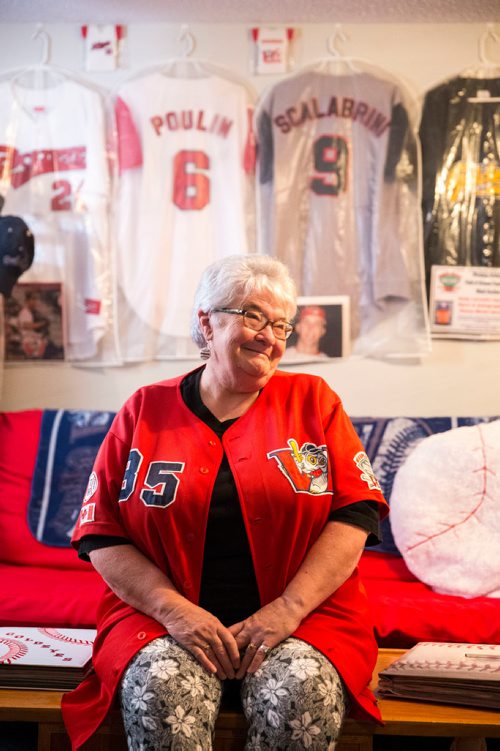 MIKAELA MACKENZIE / WINNIPEG FREE PRESS
Brenda Arnott in her basement, which is devoted to Goldeyes paraphernalia, in Winnipeg on Friday, June 22, 2018. 
Mikaela MacKenzie / Winnipeg Free Press 2018.