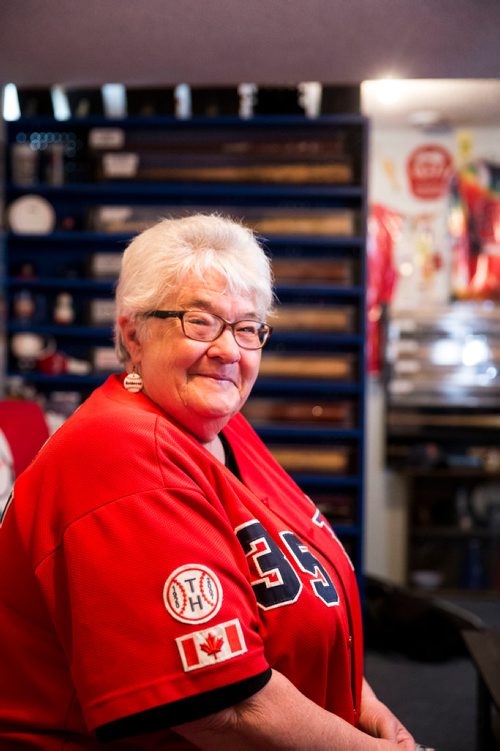 MIKAELA MACKENZIE / WINNIPEG FREE PRESS
Brenda Arnott in her basement, which is devoted to Goldeyes paraphernalia, in Winnipeg on Friday, June 22, 2018. 
Mikaela MacKenzie / Winnipeg Free Press 2018.