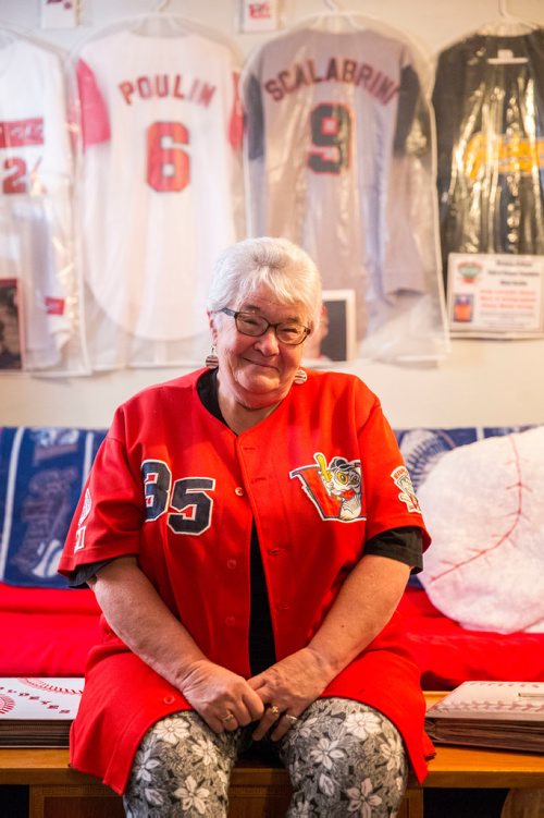 MIKAELA MACKENZIE / WINNIPEG FREE PRESS
Brenda Arnott in her basement, which is devoted to Goldeyes paraphernalia, in Winnipeg on Friday, June 22, 2018. 
Mikaela MacKenzie / Winnipeg Free Press 2018.