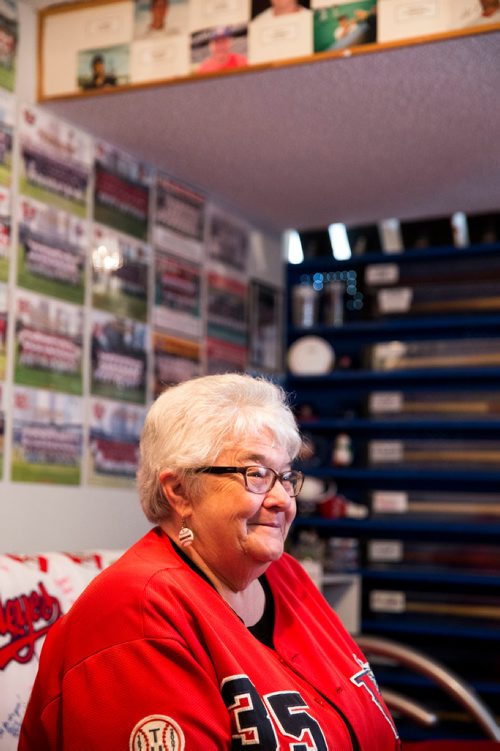 MIKAELA MACKENZIE / WINNIPEG FREE PRESS
Brenda Arnott in her basement, which is devoted to Goldeyes paraphernalia, in Winnipeg on Friday, June 22, 2018. 
Mikaela MacKenzie / Winnipeg Free Press 2018.