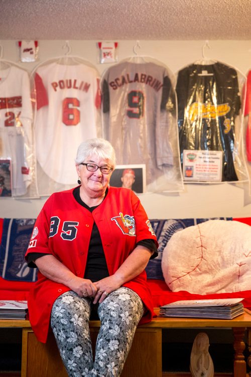 MIKAELA MACKENZIE / WINNIPEG FREE PRESS
Brenda Arnott in her basement, which is devoted to Goldeyes paraphernalia, in Winnipeg on Friday, June 22, 2018. 
Mikaela MacKenzie / Winnipeg Free Press 2018.