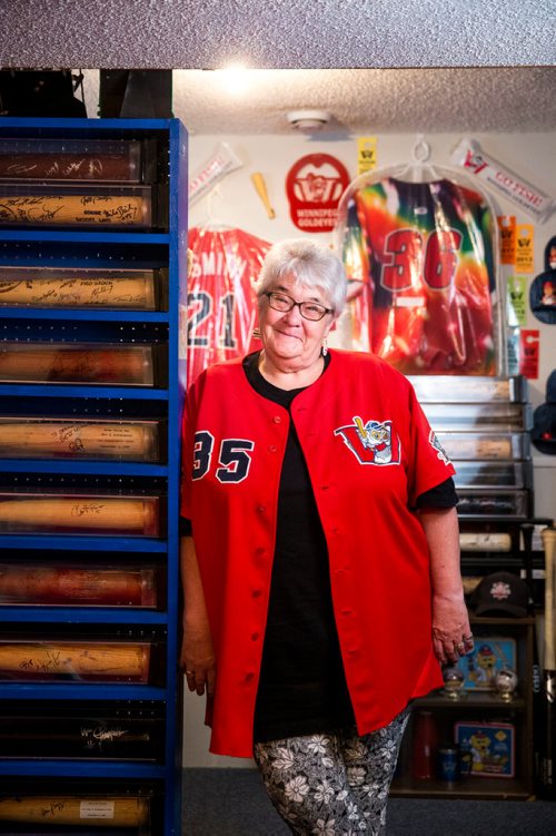 MIKAELA MACKENZIE / WINNIPEG FREE PRESS
Brenda Arnott in her basement, which is devoted to Goldeyes paraphernalia, in Winnipeg on Friday, June 22, 2018. 
Mikaela MacKenzie / Winnipeg Free Press 2018.