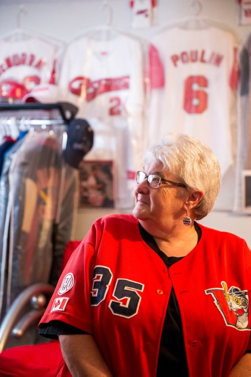 MIKAELA MACKENZIE / WINNIPEG FREE PRESS
Brenda Arnott in her basement, which is devoted to Goldeyes paraphernalia, in Winnipeg on Friday, June 22, 2018. 
Mikaela MacKenzie / Winnipeg Free Press 2018.