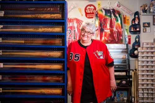 MIKAELA MACKENZIE / WINNIPEG FREE PRESS
Brenda Arnott in her basement, which is devoted to Goldeyes paraphernalia, in Winnipeg on Friday, June 22, 2018. 
Mikaela MacKenzie / Winnipeg Free Press 2018.