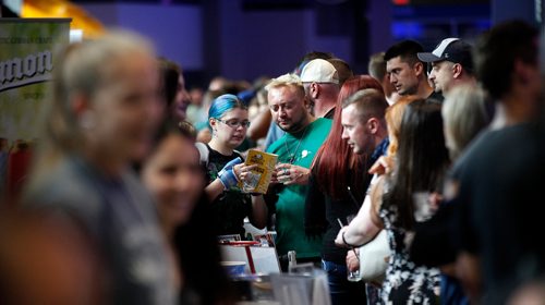 PHIL HOSSACK / WINNIPEG FREE PRESS - FLATLANDERS BEER FESTIVAL....A couple try to make an informed decision in the crowd as Thousands of "patrons" filled the MTS Centre Friday evening for the Annual festival of beers. toting tiny steins they went from vendor to vendor for free samples. See release.  - June 22, 2018