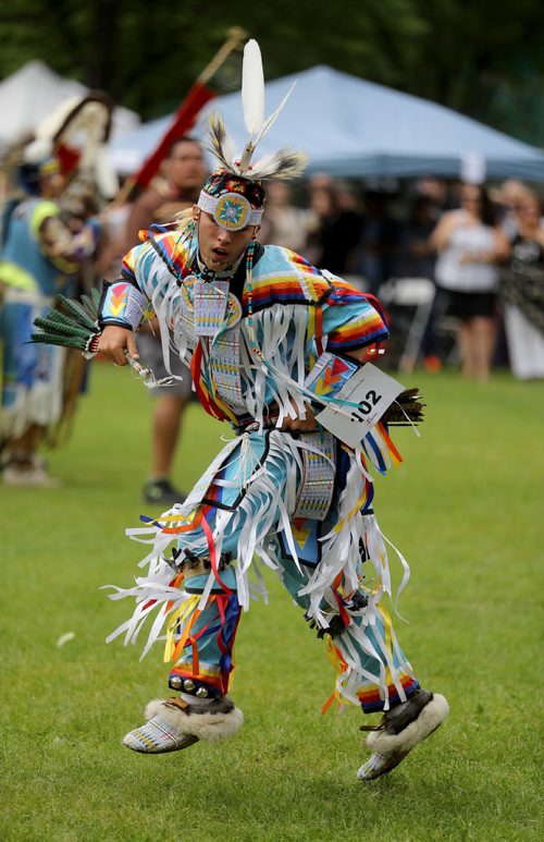 TREVOR HAGAN / WINNIPEG FREE PRESS
Michael Wade, from Six Nations, Ontario, competition in the grass dancing category, in the Pow Wow during Indigenous Day Live at The Forks, Saturday, June 23, 2018.