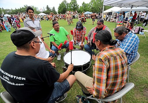 TREVOR HAGAN / WINNIPEG FREE PRESS
A drum circle performing for the pow wow, during Indigenous Day Live at The Forks, Saturday, June 23, 2018.