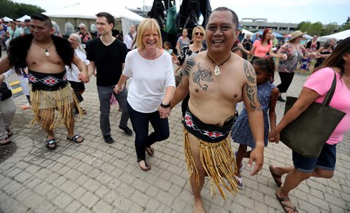TREVOR HAGAN / WINNIPEG FREE PRESS
Glenn Cruz, far left, and Don Semana, of Whakatopu Kotahi, traditional Maori performers from Toronto, participating in the Circle Dance, during Indigenous Day Live at The Forks, Saturday, June 23, 2018.