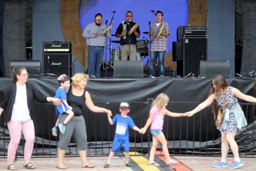 TREVOR HAGAN / WINNIPEG FREE PRESS
Roger Greene, from Shoal Lake 40, Kyle Copenace, from Whitefish Bay, Ontario and Dorian Daniels, from Sagkeeng, performing for the Circle Dance, during Indigenous Day Live at The Forks, Saturday, June 23, 2018.
