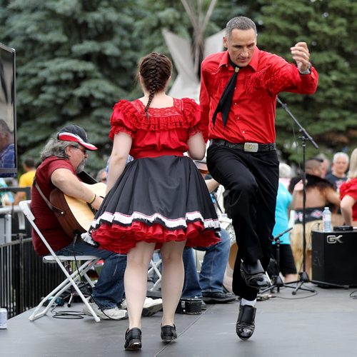 TREVOR HAGAN / WINNIPEG FREE PRESS
Kevin Chief, right, a member of The Norman Chief Memorial Dancers performing with The JJ Lavallee Band perform during Indigenous Day Live at The Forks, Saturday, June 23, 2018.