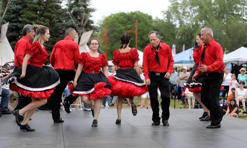 TREVOR HAGAN / WINNIPEG FREE PRESS
The Norman Chief Memorial Dancers performing with The JJ Lavallee Band perform during Indigenous Day Live at The Forks, Saturday, June 23, 2018.
