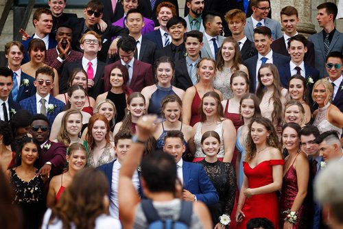 PHIL HOSSACK / WINNIPEG FREE PRESS - Students form Collège Béliveau -  Lenscaps flew, Students struck a pose and cameras clicked at the Legislative Grounds Monday as groups of graduating High School students showed up to use the fountain and stairs as a backdrop for photos. See Jen's story.  - June 25, 2018