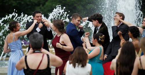 PHIL HOSSACK / WINNIPEG FREE PRESS -  Grant Park student - Lenscaps flew, Students struck a pose and camera's clicked at the Legislative Grounds Monday as groups of Graduating High School Students showed up to use the fountain and stairs as a backdrop for photos. See Jen's story.  - June 25, 2018