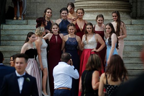 PHIL HOSSACK / WINNIPEG FREE PRESS -  Lenscaps flew, Students struck a pose and camera's clicked at the Legislative Grounds Monday as groups of Graduating High School Students showed up to use the fountain and stairs as a backdropp for photos. See Jen's story.  - June 25, 2018