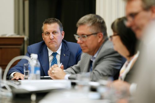 JOHN WOODS / WINNIPEG FREE PRESS
Cliff Cullen, Minister of Crown Services, listens in as Kelvin Shepherd, President and CEO of Manitoba Hydro and Marina James, Chairperson of the Board of Manitoba Hydro present to the Standing Committee on Crown Corporations at the Manitoba Legislature in Winnipeg Monday, June 25, 2018.