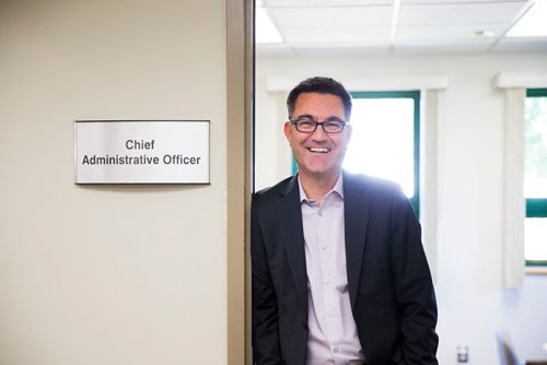 MIKAELA MACKENZIE / WINNIPEG FREE PRESS
Brad Collett, CAO for City of Dauphin, poses in his office at the Dauphin City Hall on Wednesday, June 27, 2018. 
Mikaela MacKenzie / Winnipeg Free Press 2018.