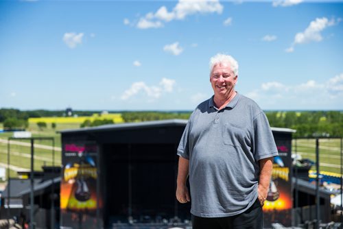 MIKAELA MACKENZIE / WINNIPEG FREE PRESS
Rob Woloschuk, general manager of Countryfest, poses in the bleachers in front of the main festival stage outside of Dauphin on Wednesday, June 27, 2018.
Mikaela MacKenzie / Winnipeg Free Press 2018.