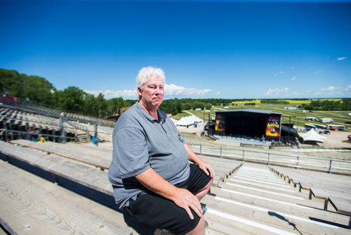 MIKAELA MACKENZIE / WINNIPEG FREE PRESS
Rob Woloschuk, general manager of Countryfest, poses in the bleachers in front of the main festival stage outside of Dauphin on Wednesday, June 27, 2018.
Mikaela MacKenzie / Winnipeg Free Press 2018.