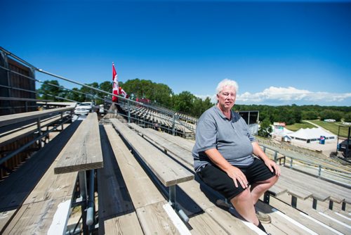 MIKAELA MACKENZIE / WINNIPEG FREE PRESS
Rob Woloschuk, general manager of Countryfest, poses in the bleachers in front of the main festival stage outside of Dauphin on Wednesday, June 27, 2018.
Mikaela MacKenzie / Winnipeg Free Press 2018.