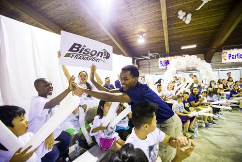 MIKAELA MACKENZIE / WINNIPEG FREE PRESS
Intern Maeron Meresi high-fives his section after being chosen in a draft-pick style process in the Youth CEO summer internship program at the Old Exhibition Arena in Winnipeg on Thursday, June 28, 2018.
Mikaela MacKenzie / Winnipeg Free Press 2018.