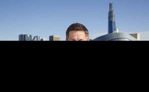 MIKE DEAL / WINNIPEG FREE PRESS
Winnipeg Mayor Brian Bowman on the roof of The Inn at The Forks with the skyline of the city behind him.
180628 - Thursday, June 28, 2018.