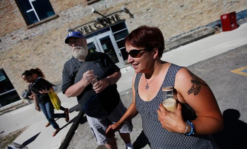 PHIL HOSSACK / WINNIPEG FREE PRESS - Patrick Doyle and Justine Kruz found out Thursday along with other customers that the doors close Saturday at Neechi Commons. See Maggie Macintosh story. - June 27, 2018