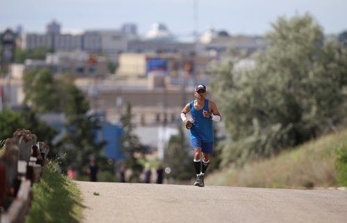 TREVOR HAGAN / WINNIPEG FREE PRESS
Junel Malapad is running 160kms up and down Garbage Hill, in an event he calls Taking Stigma to the Trash, that will raise mental-health awareness as well as money for the Canadian Mental Health Association, Friday, June 29, 2018.
