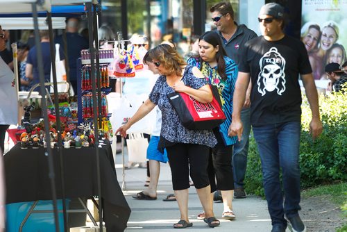 Phil Hossack / Winnipeg Free Press -  Patrons browse the stalls at Winnipeg's Night Market downtown Friday evening. See story. June 29, 2018