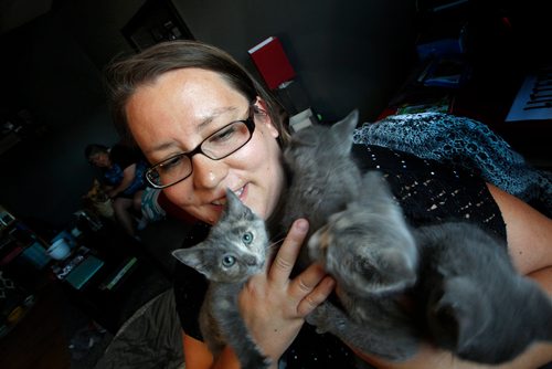Phil Hossack / Winnipeg Free Press - Foster parent for the Winnipeg Humane Society Jill Bristow wrestles with a ball of fur containing four kittens, one of which is her 100th foster kitten. See Neil Coligan story.  June 29, 2018