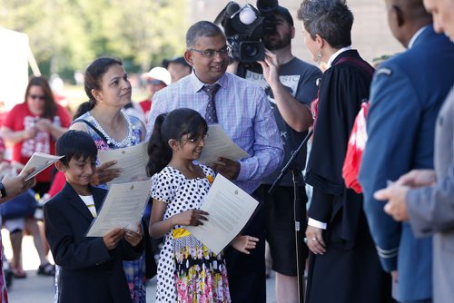 JOHN WOODS / WINNIPEG FREE PRESS
the Lad family, from left, Ved, Alkakumari, Pratha, and Jitendrakumar recive their citizenship on Canada Day at Assiniboine Park, Sunday, July 1, 2018.