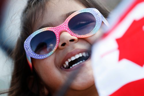 JOHN WOODS / WINNIPEG FREE PRESS
Suramya Patel, 3, celebrates after watching her father receive his citizenship during a ceremony on Canada Day at Assiniboine Park, Sunday, July 1, 2018.