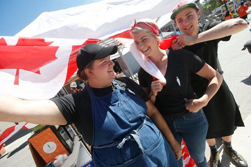 JOHN WOODS / WINNIPEG FREE PRESS
Danielle and Meghan Verrier with Jaden Sokalski from the Green carrot celebrate Canada Day at Osborne Village, Sunday, July 1, 2018.