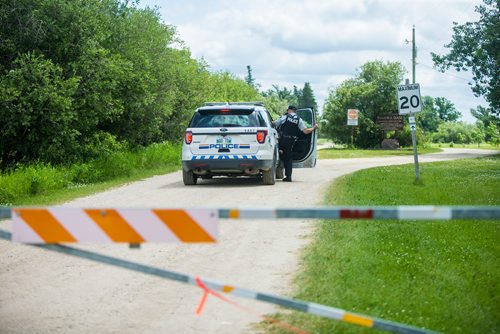 MIKAELA MACKENZIE / WINNIPEG FREE PRESS
RCMP go into the Pinawa Dam site after a body was recovered on Wednesday, July 4, 2018.
Mikaela MacKenzie / Winnipeg Free Press 2018.