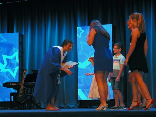 Canstar Community News June 21, 2018 - Hayley Shirtliff received one of the two Kelly Kabernick Memorial Scholarships presented by Kelly's family at Sanford Collegiate's graduation on June 21. The other scholarship was awarded to Nicholas Pasieczka. (ANDREA GEARY/CANSTAR COMMUNITY NEWS)