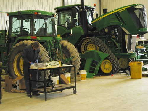 Canstar Community News June 25, 2018 - Repairing John Deere farm machinery and lawn and garden equipment as well as recreational vehicles is done at Enns Brothers in Portage la Prairie. (ANDREA GEARY/CANSTASR COMMUNITY NEWS)